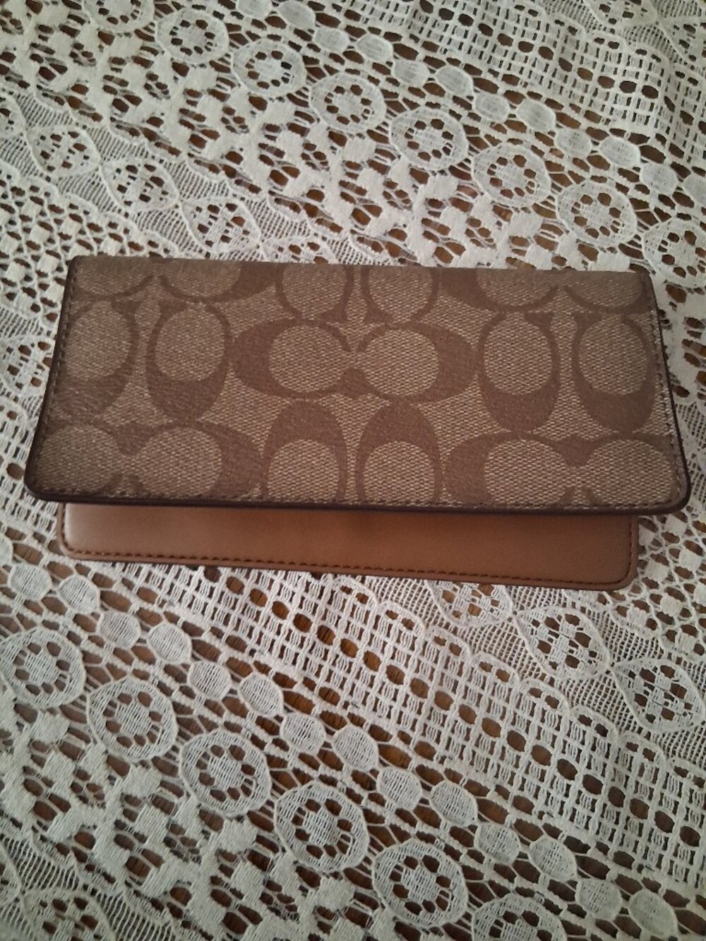 Coach check book cover
